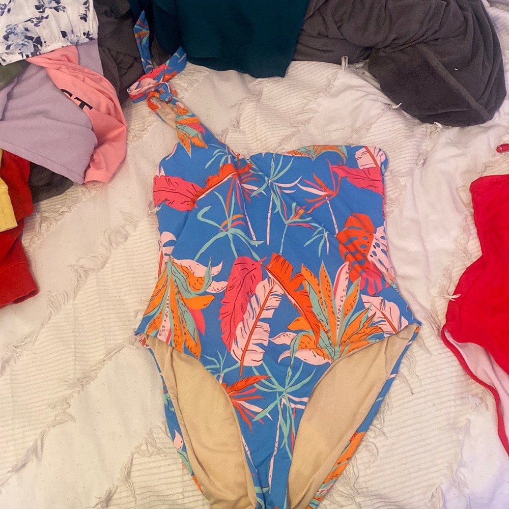 One piece swim suit.